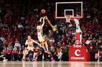 Tarris Reed Jr. (32) and Nimari Burnett (4)