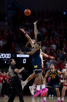 Tarris Reed Jr. (32) and Olivier Nkamhoua (13)