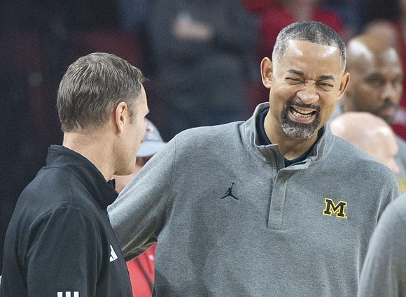 Nebraska Head Coach Fred Hoiberg and Juwan Howard