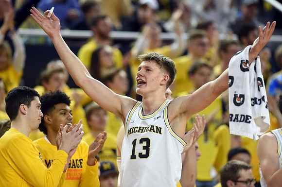 Sean Lonergan (20), Ibi Watson (23), and Moritz Wagner (13)