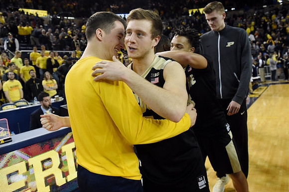 Andrew Dakich (11) and Spike Albrecht