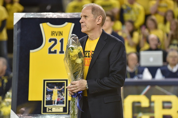 Zak Irvin (21) and John Beilein