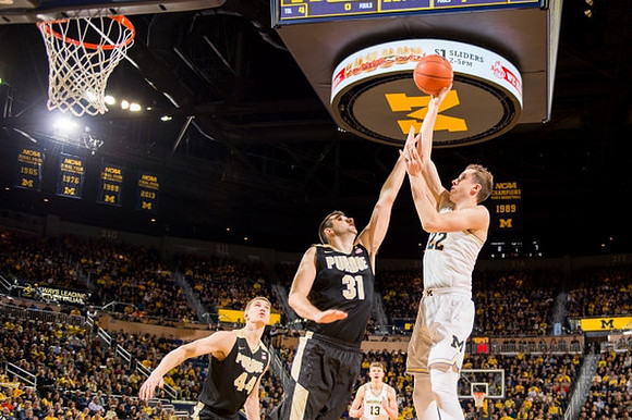 Duncan Robinson (22) and Moritz Wagner (13)