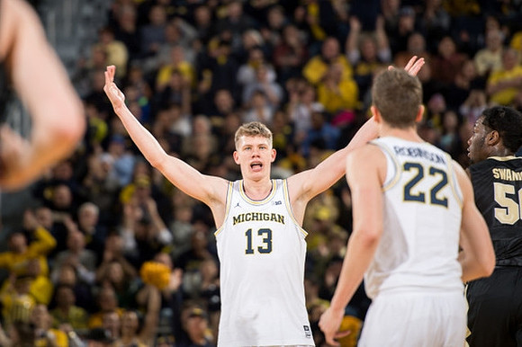 Moritz Wagner (13) and Duncan Robinson (22)