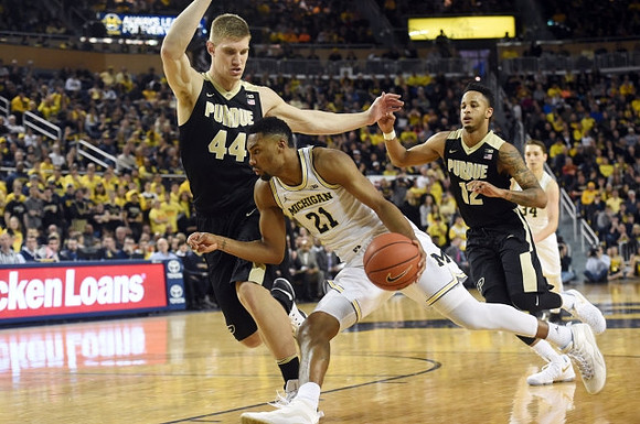 Zak Irvin (21) and Mark Donnal (34)