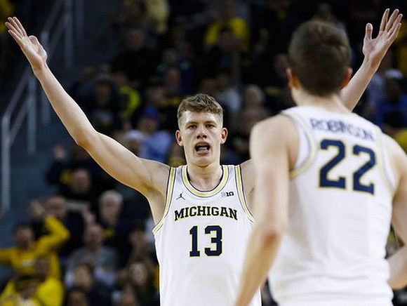 Moritz Wagner (13) and Duncan Robinson (22)