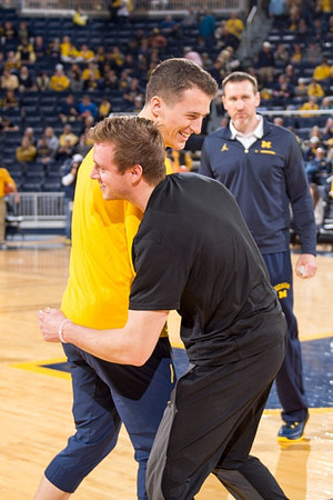 Andrew Dakich (11) and Spike Albrecht