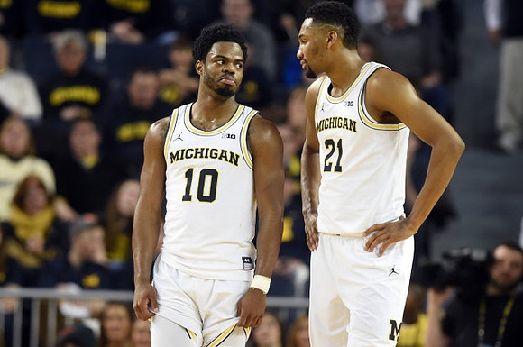 Derrick Walton Jr. (10) and Zak Irvin (21)