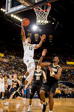 Derrick Walton Jr. (10) and Muhammad-Ali Abdur-Rahkman (12)
