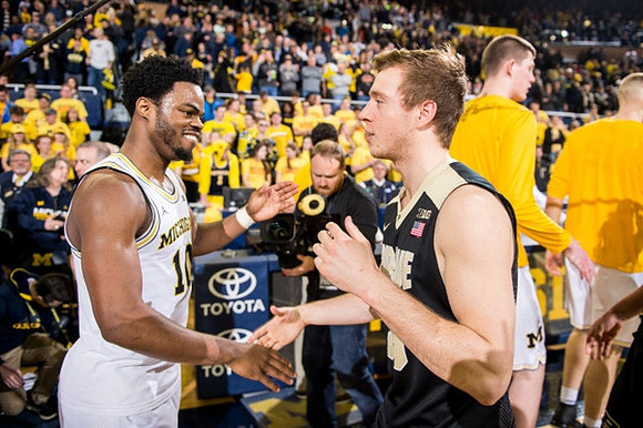 Derrick Walton Jr. (10) and Spike Albrecht