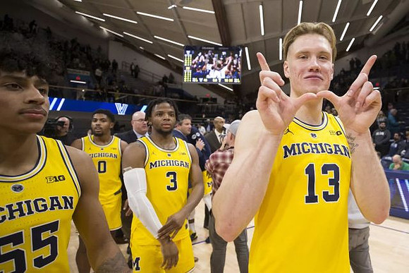 Eli Brooks (55), David DeJulius (0), Zavier Simpson (3), and Ignas Brazdeikis (13)