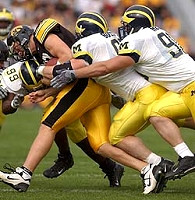 Pierre Woods (99), Grant Bowman (60), and Norman Heuer (90)