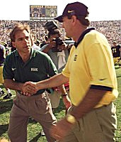 Lloyd Carr and Nick Saban