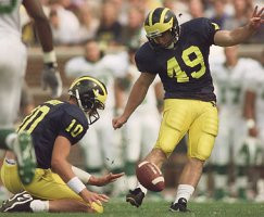 Tom Brady (10) and Jay Feely (49)
