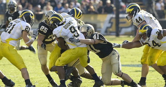 Martavious Odoms (9), Jordan Reilly (21), Brandon Minor (4), Kevin Grady (24), and Mark Moundros (44)