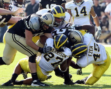 Brandon Harrison (27), Obi Ezeh (45), and Morgan Trent (14)