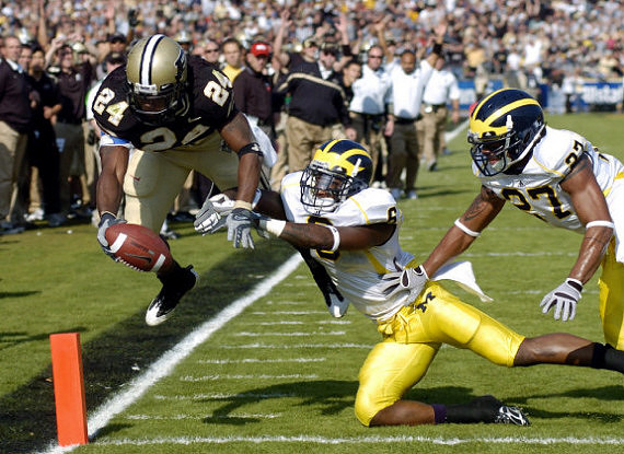 Donovan Warren (6) and Brandon Harrison (27)