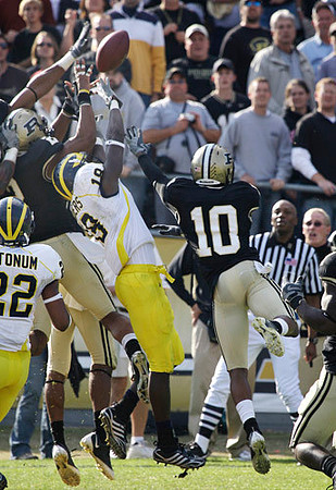 James Rogers (18) and Darryl Stonum (22)