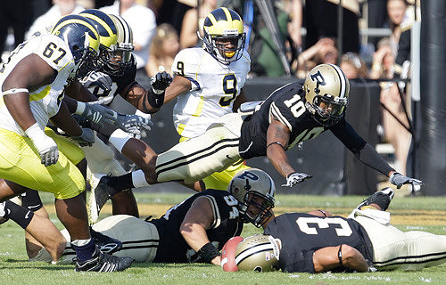 Terrance Taylor (67) and Marell Evans (9)