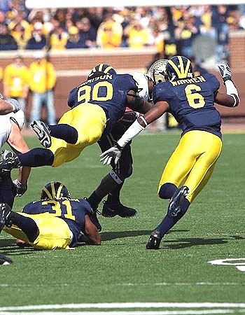 Brandent Englemon, Tim Jamison, and Donovan Warren