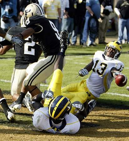 James Rogers (18) and Greg Mathews (13)