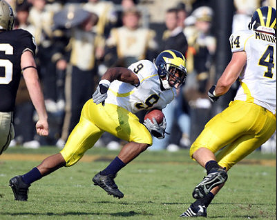 Martavious Odoms (9) and Mark Moundros (44)