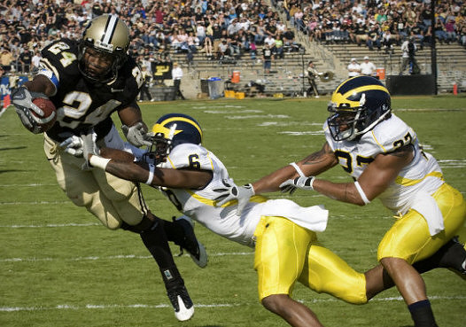 Donovan Warren (6) and Brandon Harrison (27)