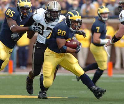 Michael Hart, Carson Butler, and Chad Henne