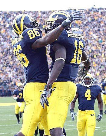 Mario Manningham, Adrian Arrington, and Brandon Minor