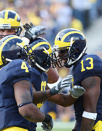 Mario Manningham, Brandon Minor, and Greg Mathews
