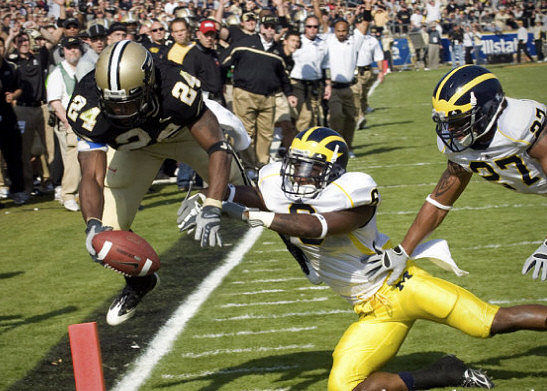 Donovan Warren (6) and Brandon Harrison (27)