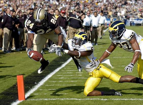 Donovan Warren (6) and Brandon Harrison (27)