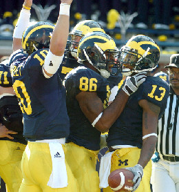 Steven Threet (10), Kevin Koger (86), and Greg Mathews (13)