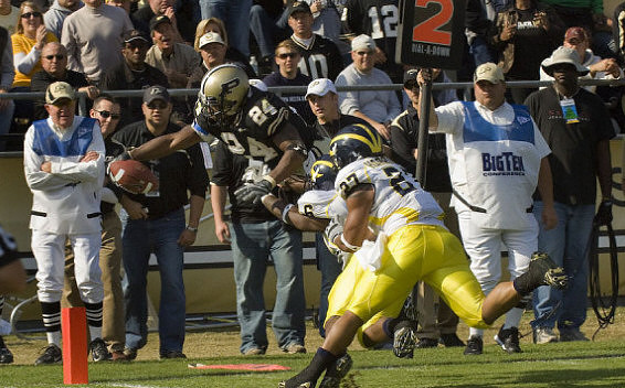 Donovan Warren (6) and Brandon Harrison (27)