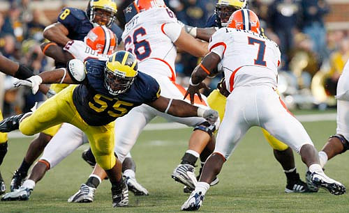 Brandon Graham (55) and Jonas Mouton (8)
