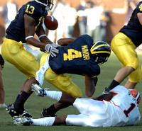Greg Mathews (13), Brandon Minor (4), and Mark Moundros (44)