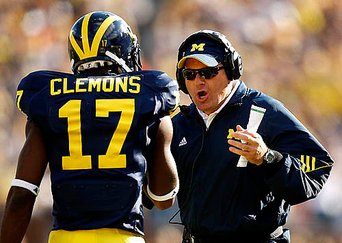 Toney Clemons (17) and Rich Rodriguez