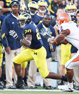 Michael Shaw (20) and Fred Jackson