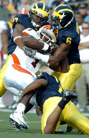 Brandon Harrison (27), Donovan Warren (6), and Jonas Mouton (8)
