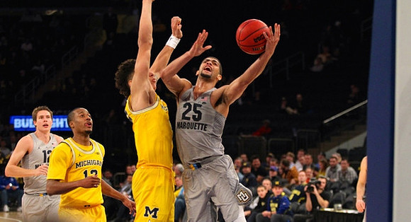 Muhammad-Ali Abdur-Rahkman (12) and D.J. Wilson (5)