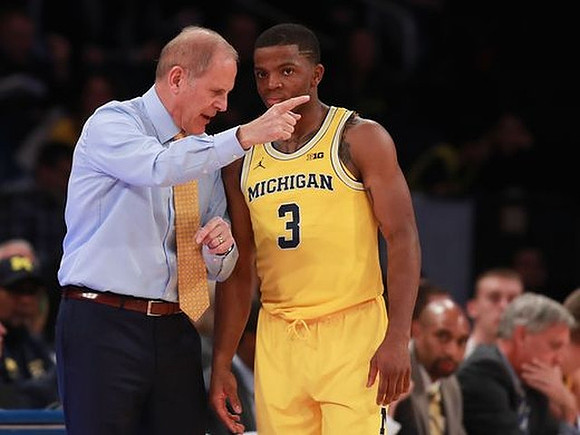 John Beilein and Xavier Simpson (3)