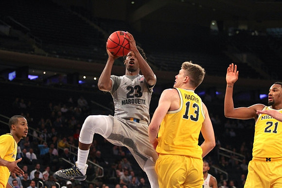 Muhammad-Ali Abdur-Rahkman (12), Moritz Wagner (13), and Zak Irvin (21)