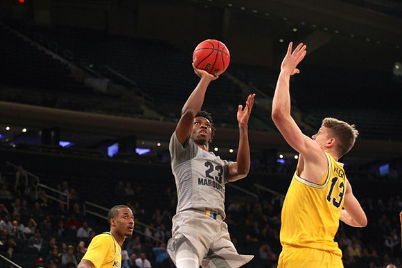 Muhammad-Ali Abdur-Rahkman (12) and Moritz Wagner (13)