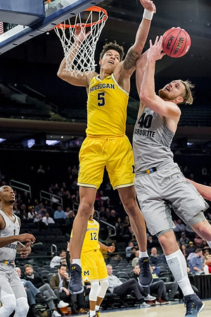 D.J. Wilson (5) and Muhammad-Ali Abdur-Rahkman (12)