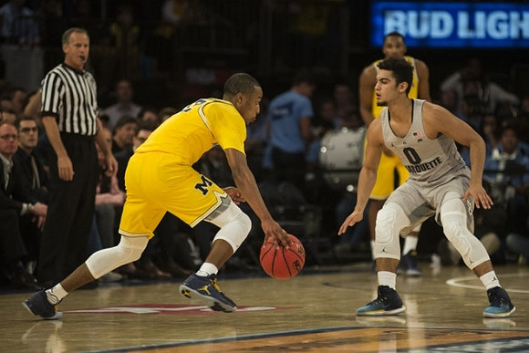 Muhammad-Ali Abdur-Rahkman (12) and Zak Irvin (21)