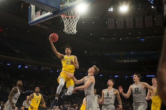 Xavier Simpson (3), Ibi Watson (23), and Jon Teske (15)