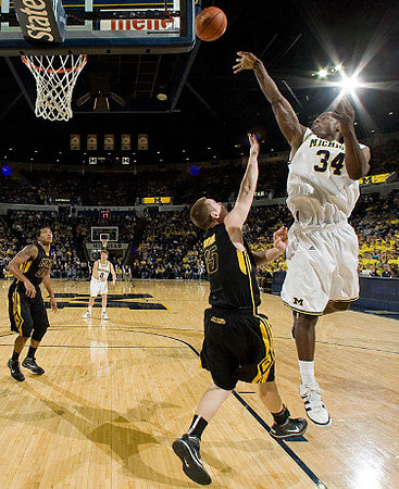 DeShawn Sims (34) and Zack Novak (0)