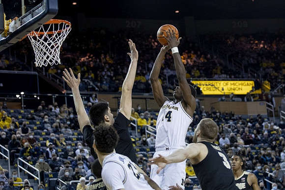 Brandon Johns Jr. (23) and Moussa Diabate (14)