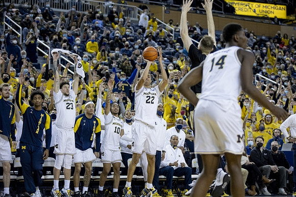 Caleb Houstan (22) and Moussa Diabate (14)
