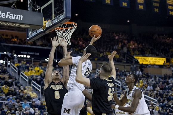 Caleb Houstan (22) and Moussa Diabate (14)